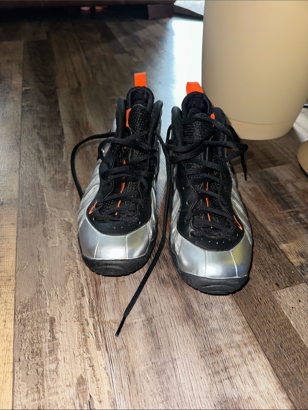 Nike Foamposite Kids Silver and Black Sneakers with Orange Accents